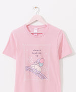 Light pink Pusheen tee hangs on a hanger. The fair-themed pink tee is apart of the Pusheen's 15th Anniversary collection.