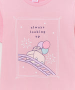 Close-up of the anniversary tee graphic. The large front graphic features a pastel gray Pusheen with the phrase "always looking up" above the fair-themed graphic.