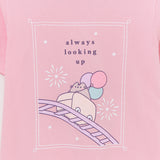 Close-up of the anniversary tee graphic. The large front graphic features a pastel gray Pusheen with the phrase "always looking up" above the fair-themed graphic.