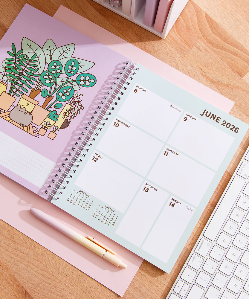 Calendar open to the second week of June 2026. The page spread is plant themed.