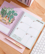 Calendar open to the second week of June 2026. The page spread is plant themed.