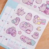 Close-up of the Gamer Pusheen-themed stickers included with the 2026 Wall Calendar.