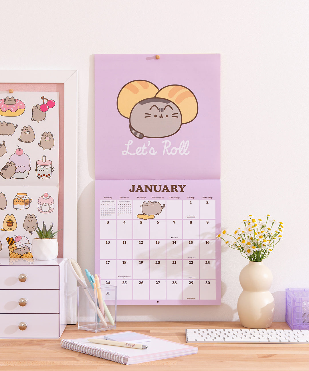 January 2027 spread in the Pusheen Calendar. The top half includes a full page graphics while the bottom half includes a full month calendar view. 