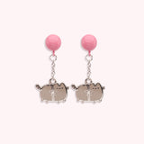 Front view of the Pusheen Balloon Dangle Earrings. The silver-outlined tabby cat is attached to and dangles from to a pink balloon that acts as the earrings post. 