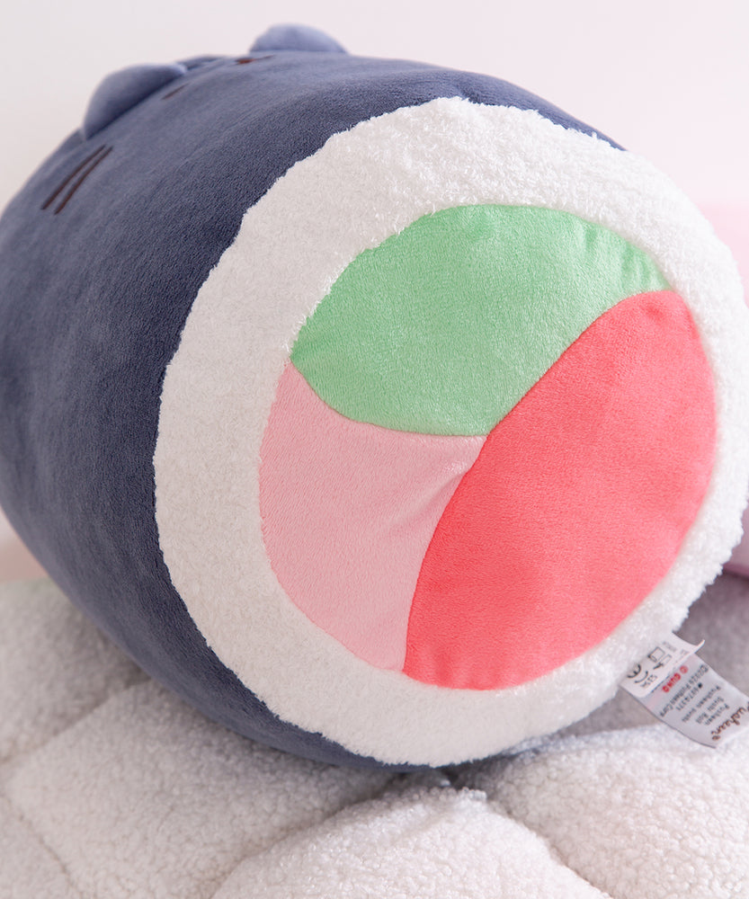 View of the bottom of the sushi plush to show that the "fillings" can be seen from the top and bottom of the plush.