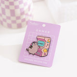 Gamer Pusheen Arcade Pin tilted to show the sheen of the pin's black outline. 