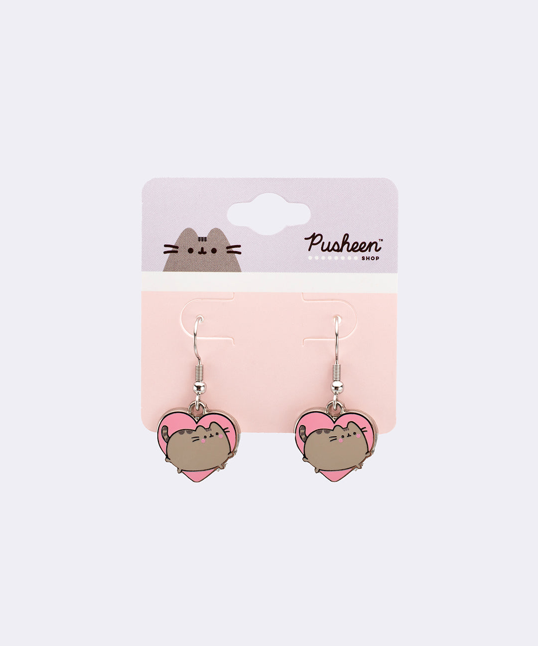 Pusheen Heart Dangle Earrings featuring Pusheen inside a pink heart with silver details. The earrings are displayed on a pink, purple, and white backer card.