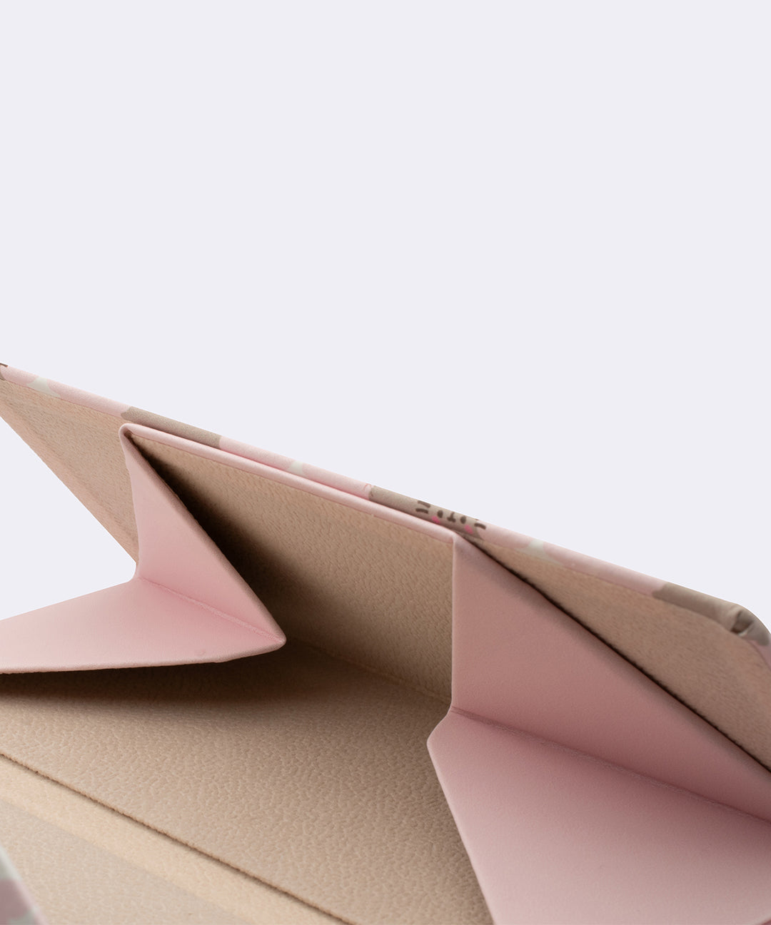 Interior close-up of the Glasses Case showing the light beige interior of the light pink case.