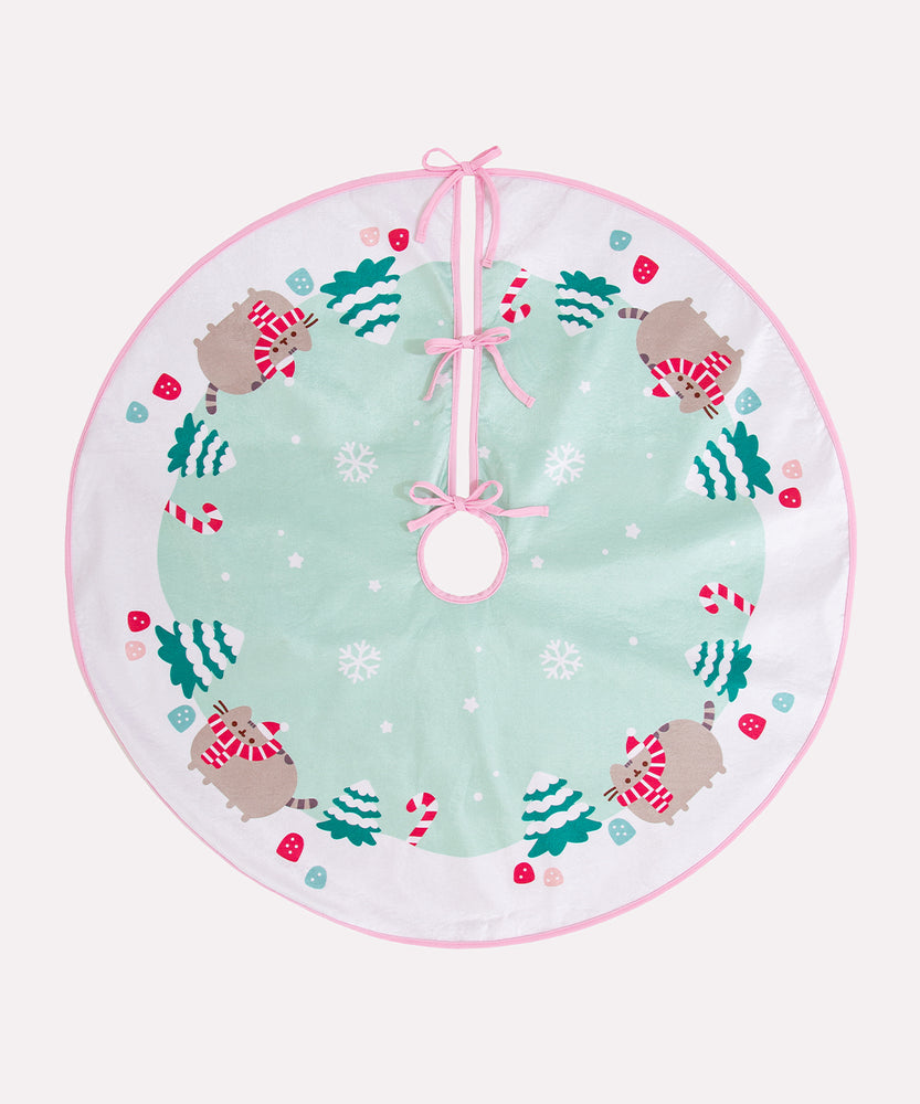 Pusheen Holiday Tree Skirt folded in half to show the scale of the repeating printed pattern.
