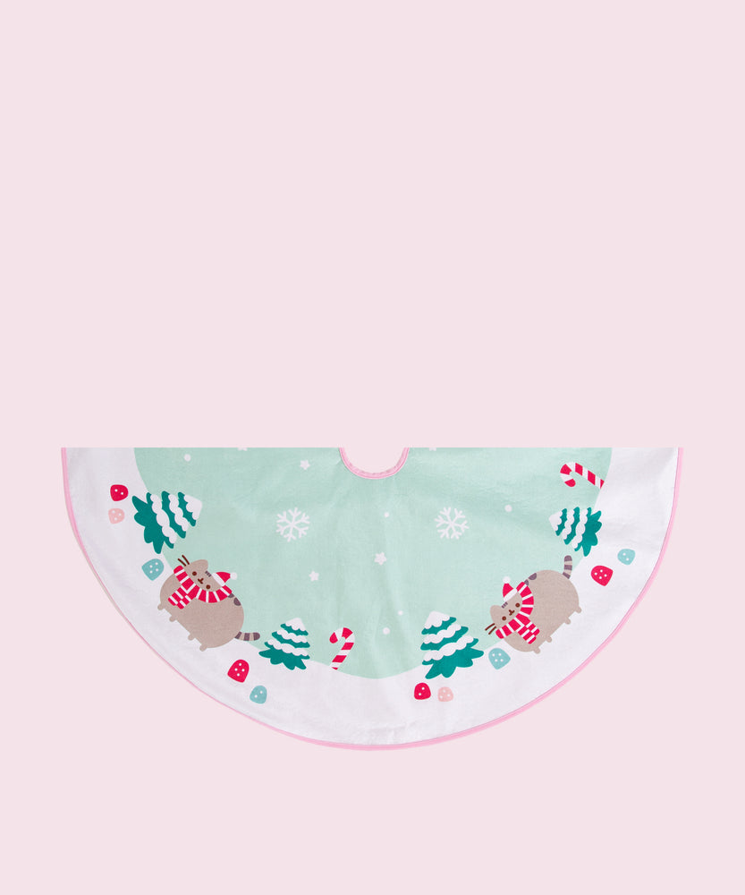 Pusheen Holiday Tree Skirt folded in half to show the scale of the repeating printed pattern.