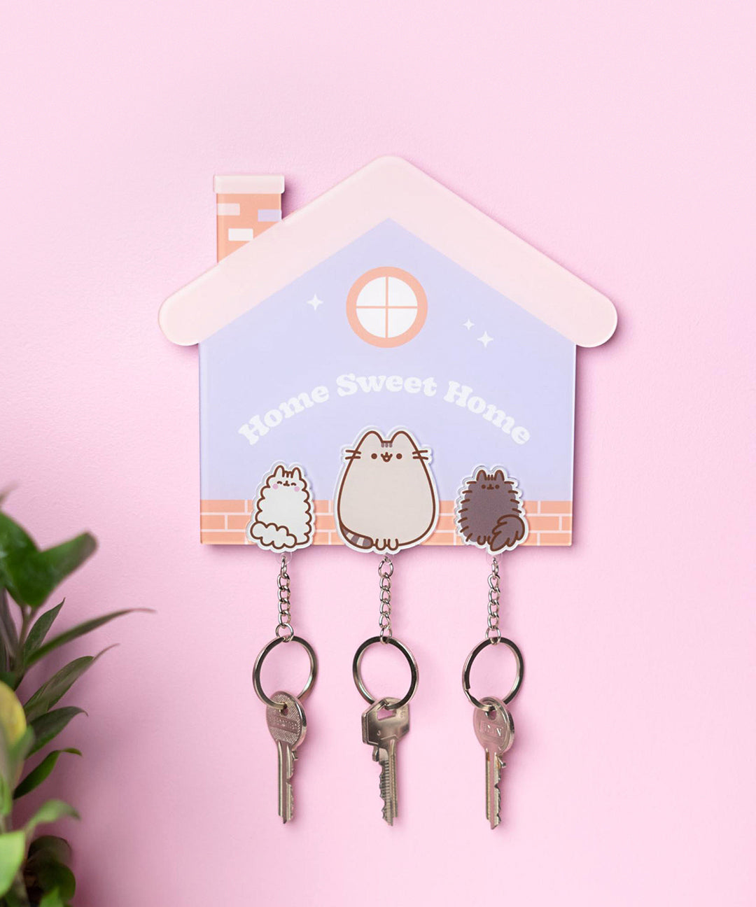 Pusheen Magnetic Keychain Holder shaped like a house and holds three cat keychains featuring Pusheen, Stormy, and Pip.