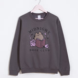 Gray sweatshirt with Midnight Book Club text and Pusheen the Cat hanging on a hanger on a white background.