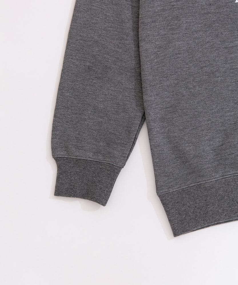 Close-up view of the ribbed hem and cuffs on the Pusheen Nap Club Loungewear Top.
