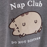 Close-upf of flocked treatment on the Nap Club Pusheen Sweatshirt. The gray cat is shown with brown details and outlined in black.