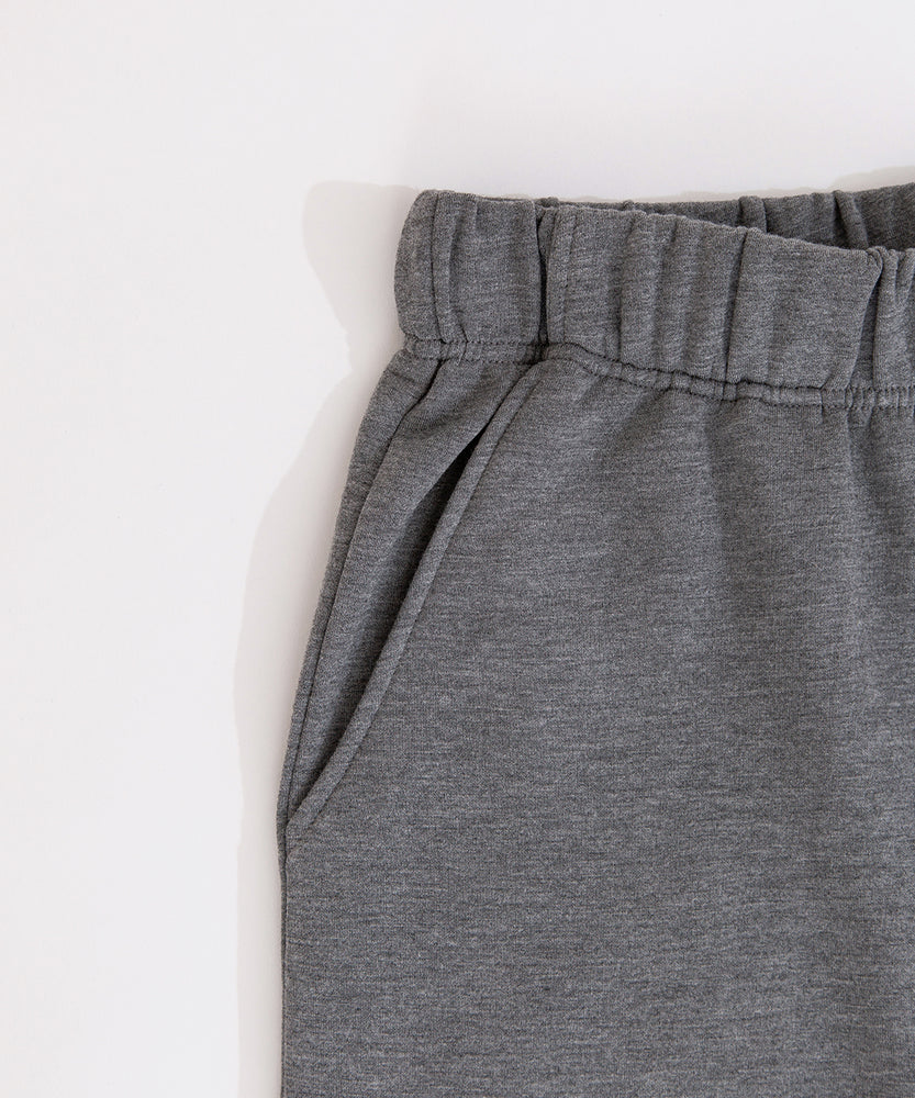 Close-up of the stretch waistband and side pocket on the pants of the heather gray Nap Club Loungewear Set.