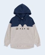 A two-toned blue and light grey sweatshirt with sleeves folded out to the side against a white background. The sweatshirt has a printed graphic of a classic Pusheen the Cat on the center of the chest in dark gray.  