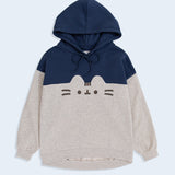 A two-toned blue and light grey sweatshirt with sleeves folded out to the side against a white background. The sweatshirt has a printed graphic of a classic Pusheen the Cat on the center of the chest in dark gray.  