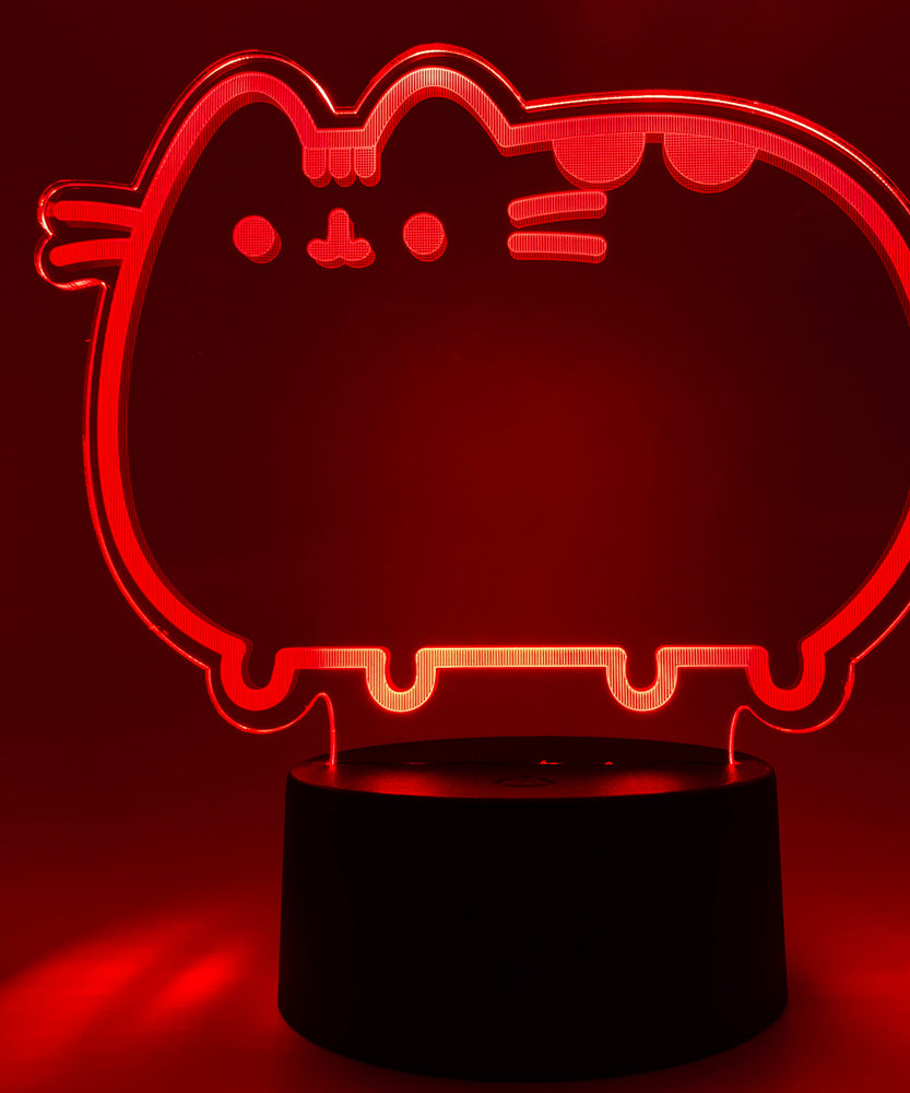 Close-up of the acrylic plate on the Pusheen Otaku Lamp. The lamp is set to the color red.