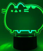 Close-up of the acrylic plate on the Pusheen Otaku Lamp. The lamp is set to the color green