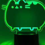 Close-up of the acrylic plate on the Pusheen Otaku Lamp. The lamp is set to the color green