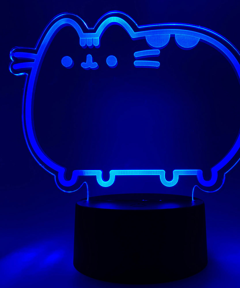 Close-up of the acrylic plate on the Pusheen Otaku Lamp. The lamp is set to the color dark blue.