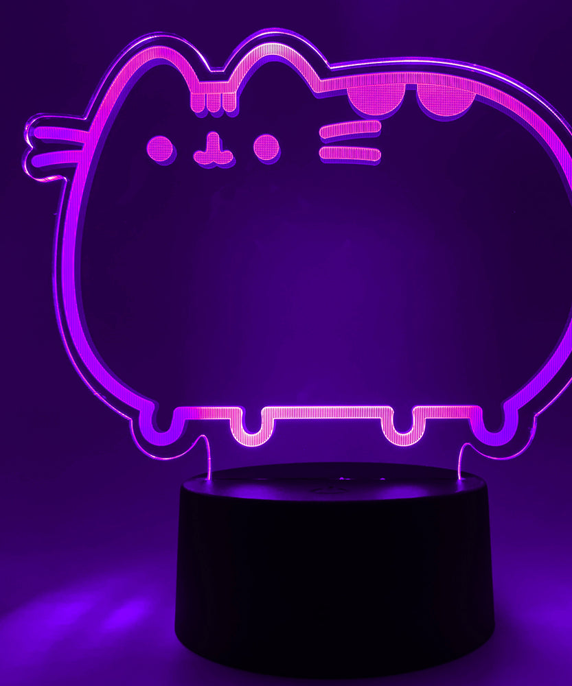 Close-up of the acrylic plate on the Pusheen Otaku Lamp. The lamp is set to the color pink purple.