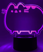 Close-up of the acrylic plate on the Pusheen Otaku Lamp. The lamp is set to the color pink purple.