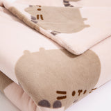Patterned Plush Blanket folded to show both sides of the repeating pattern on the Pusheen blanket. 