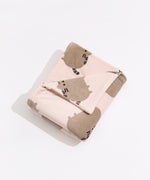 Plush blanket with Pusheen all-over pattern folded in a rectangle.