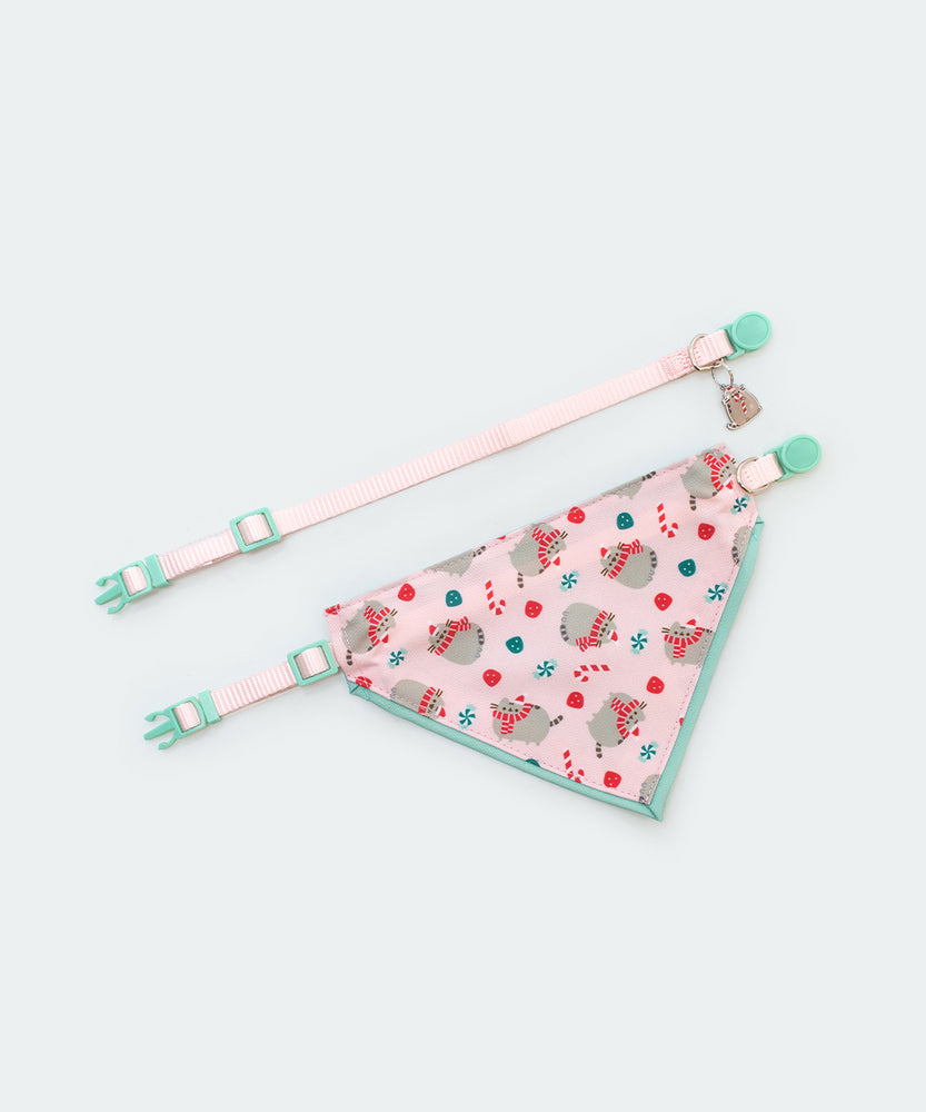 Pusheen pet Holiday-themed collar and bandana set laid out to show the length of the collars and the size of the bandana. The set has mint green clasps.