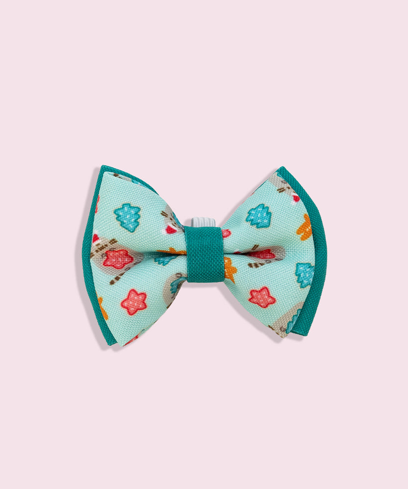 Close-up of the mint green bowtie in the Collar Bows 2-pack. The main bowtie background color is mint green and has dark green piping details. 