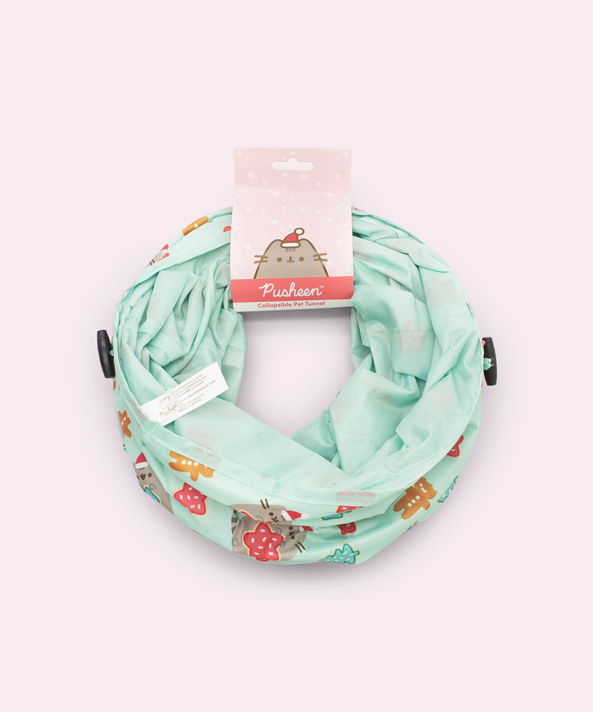 Collapsible Pet Tunnel in its packaging. The tunnel folds into a thin circle and is packaged with a red and pink label that says "Pusheen Collapsible Pet Tunnel."