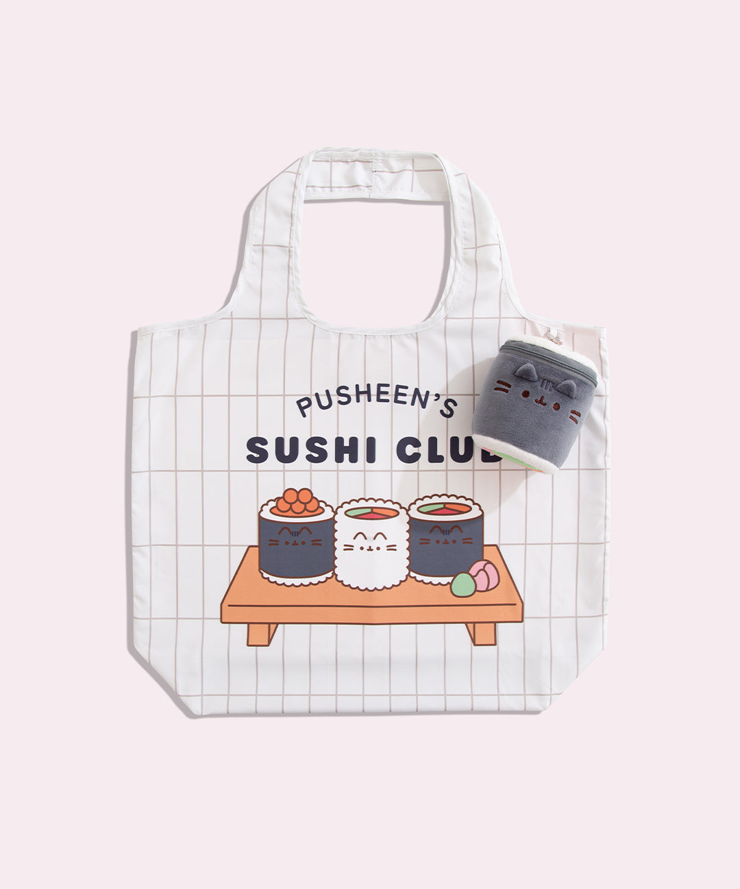 Tote bag with Pusheen's Sushi Club behind the sushi roll storage plush keychain