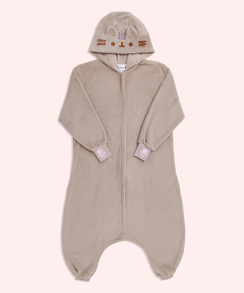 Full view of the front of the Pusheen Toe Beans Kigurumi Onesie. The onesie is a soft grey material that features Pusheen's face embroidered in grey and brown on the hood. The zipper starts at the neck and goes does to the wearer’s calves. At the ribbed cuffs are pink paw print embroidery.