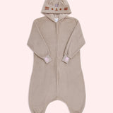 Full view of the front of the Pusheen Toe Beans Kigurumi Onesie. The onesie is a soft grey material that features Pusheen's face embroidered in grey and brown on the hood. The zipper starts at the neck and goes does to the wearer’s calves. At the ribbed cuffs are pink paw print embroidery.