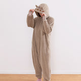 Model wearing the Pusheen Kigurumi onesie with the hood up to show the facial embroidery.
