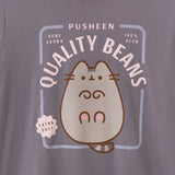 Close-up view of toe beans graphic tee. The phrases surrounded Pusheen the Cat in a light pink font are "Pusheen," "Home Grown," "100% Bean," "Quality Beans," and "Extra Soft."