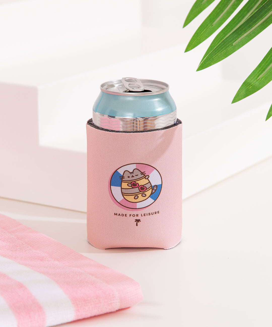 Pusheen Tropical Vacation Drink Coozie with a drink inside the pink foam sleeve to show the size and scale of the Pusheen graphic. 