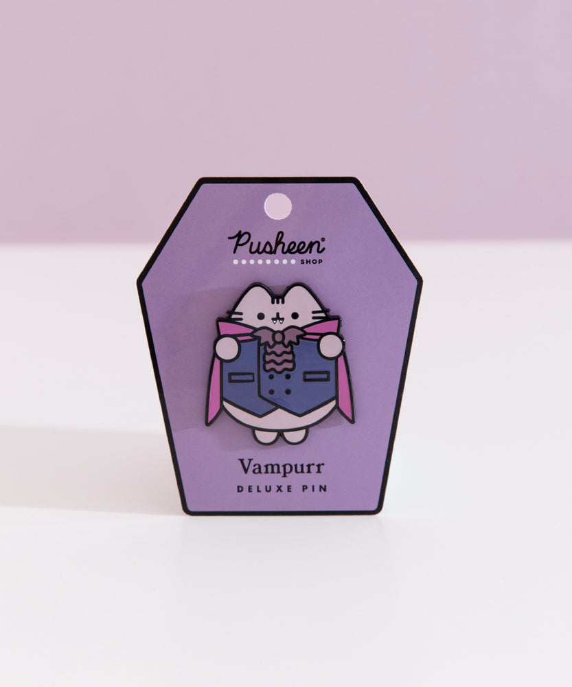 Vampurr Pusheen Pin on a purple card with a light purple background.