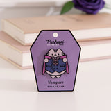 Pusheen Vampurr deluxe pin on a purple card with a white background.