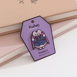 Vampire Pusheen pin shows the tabby cat is a purple hue wearing a purple cape, waistcoat, and bat bowtie. 