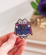Vampurr Pusheen Pin on a purple card with a light purple background.