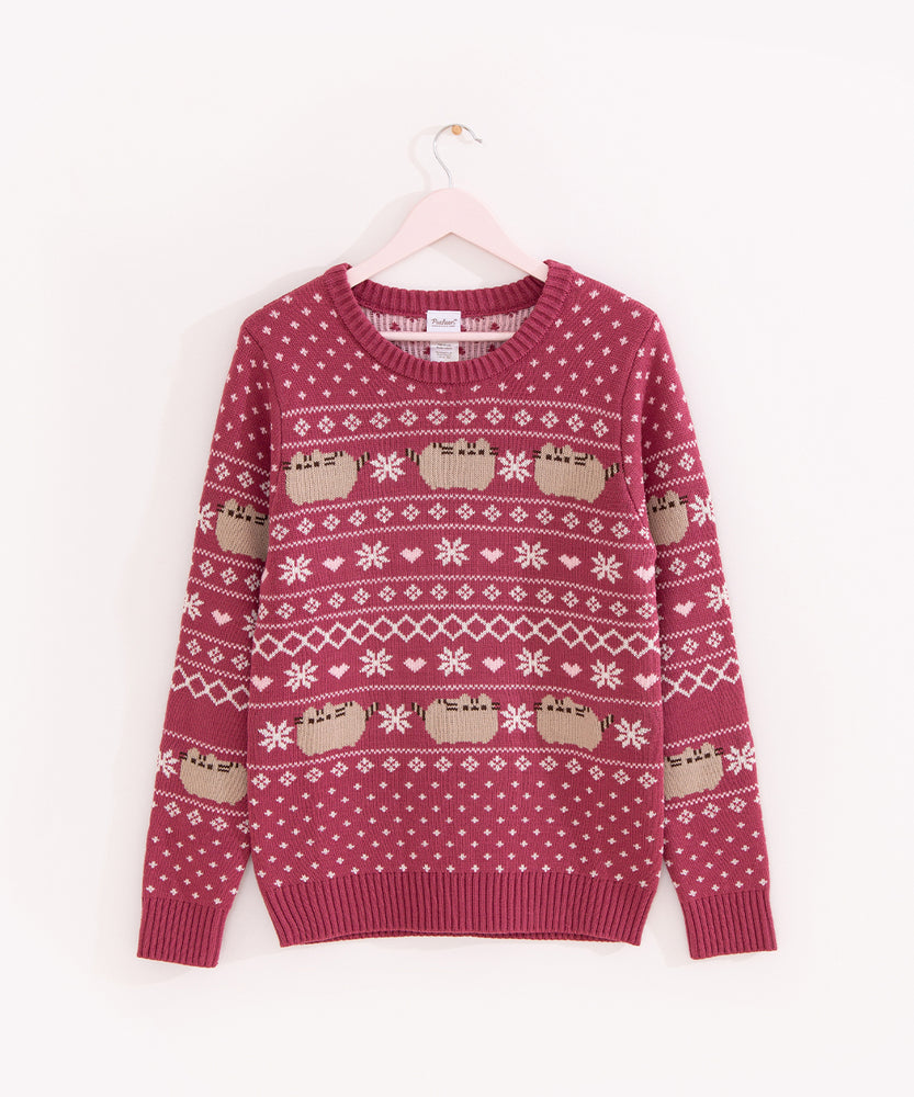 Pusheen Winter Knit Sweater hangs on a hanger to show the full length of the red and white Pusheen sweater.