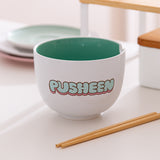 Back view of the Pusheen bowl that has 'Pusheen' text in mint green and pink bubble letters.