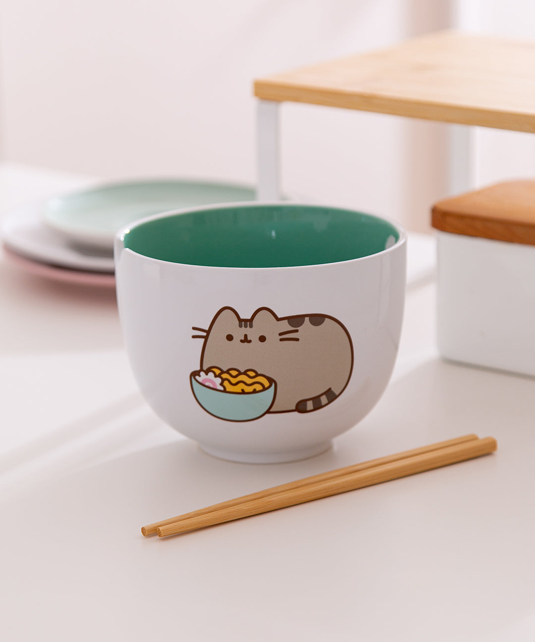 Ceramic Pusheen Yum Ramen Bowl has a large graphic of Pusheen the Cat enjoying a bowl of ramen noodles.