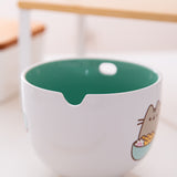 Close-up view of the notch included in the Pusheen Ramen Bowl to hold the included chopsticks.