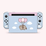 Pusheen-themed Nintendo Switch Skin on a Switch OLED in the console. The console cover is light blue and features a graphic of Pusheen the Cat being carried away into the white fluffy clouds by three balloons.