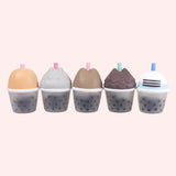 Line up of the Pusheen Bubble Tea Surprise Squishy toys' backs. Each squishy's front coloring and texture matches on the back of each respective squishy.