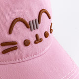 Close-up view of the 3D embroidery effect on the front center of the baseball-style cap. The eyes, mouth, whiskers and ears are shown in a warm brown thread while the three head stripes are in light grey. 
