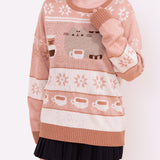 Model shows full length of knit sweater. A repeating pattern of white coffee mugs filled with a light brown drink is placed near the hem on the front and back of the sweater.